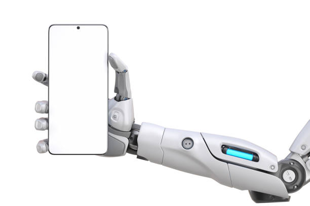 Futuristic android robot arm holding a smart phone stock photo