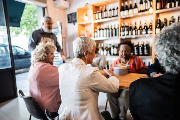 istock Friends talking at a restaurant 1798484109