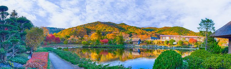 View of Sanboin Garden Old Village Area Established by Shokaku During Kamakura Period in Front of Japanese Fuji Mountain in Background During Red Maples Trees in Japan. Panoramic Image
