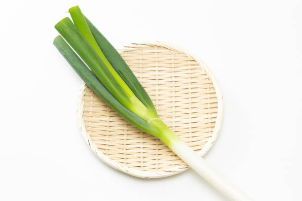 istock Green onions on a white background. 1798493393