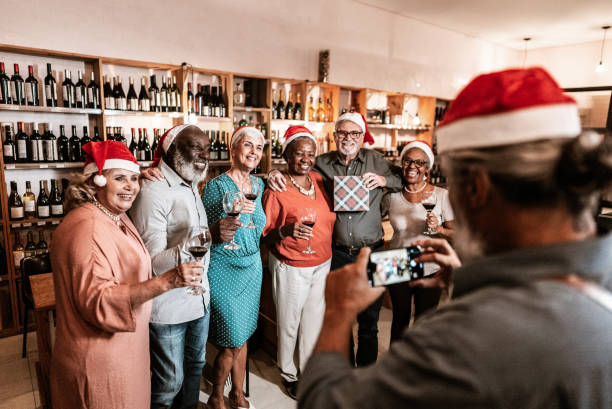istock Senior friends embracing commemorating at christmas 1798494287