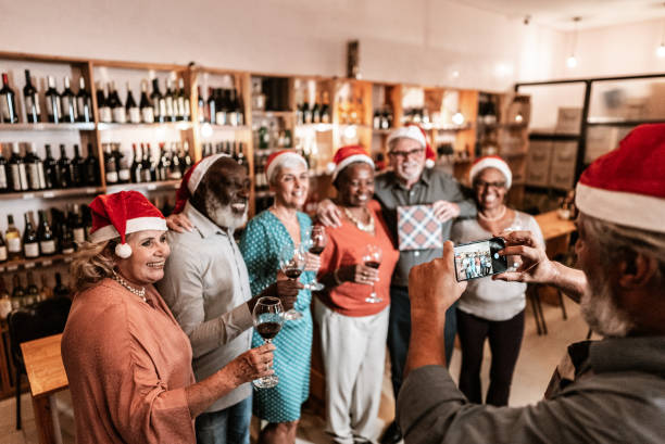 istock Senior friends embracing commemorating at christmas 1798494479
