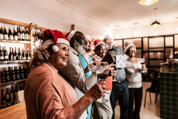 istock Senior friends embracing commemorating at christmas 1798494490