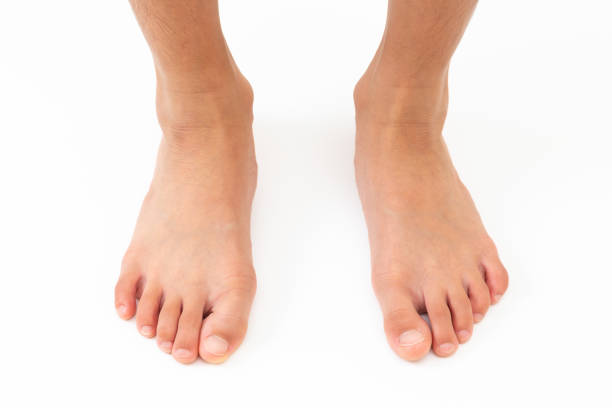 Pair of Black Footprints on White Background.