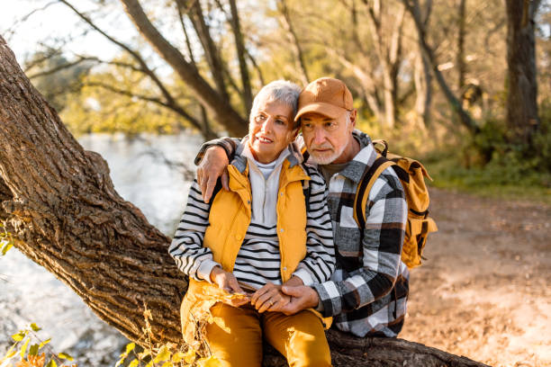 istock Senior couple enjoying sunset by the river 1798501117