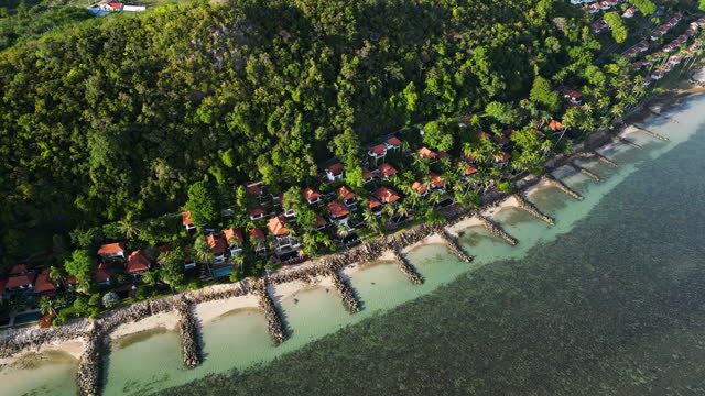 Coastal Strengthening In Koh Samui; Rock Sediments Protecting Beachfront Properties From Rising Sea Levels And Coastal Erosion.
