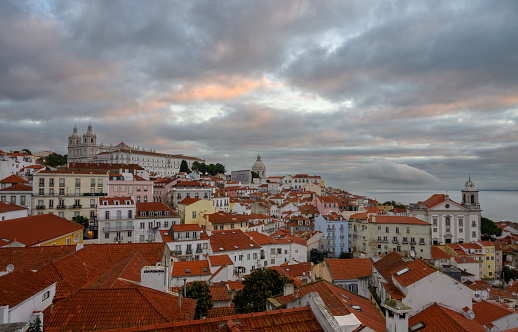 Alfama is one of Lisbon’s oldest areas. The curvy narrow streets shaped by the undulating terrain are lined with cafes and shops.