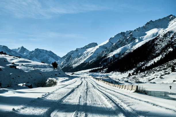 istock Snow road in winter mountain gorge 1798514932