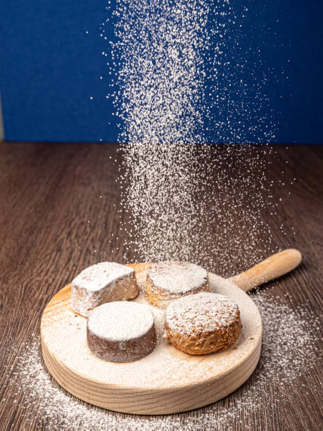 istock Sweets on wood falling sprinkled sugar 1798518394
