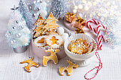 Homemade Christmas cookies on white wooden table