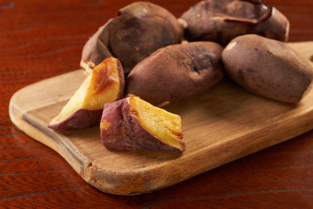 istock Bite-sized Japanese sweet potato on wooden background 1798529183