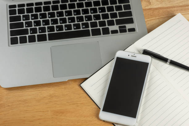 istock working business laptop phone pen booknote 1798530894