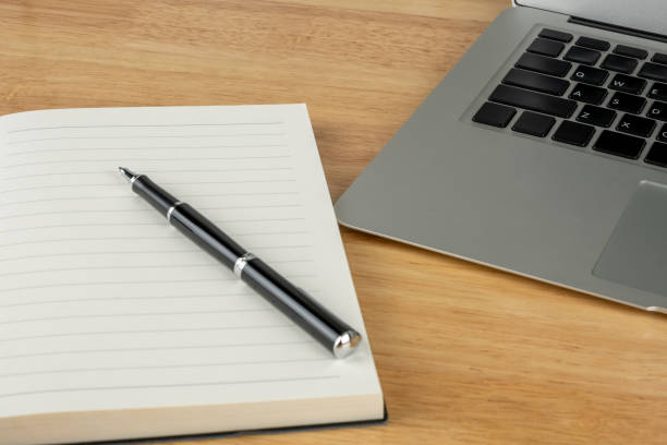 istock office business laptop booknote pen 1798530903