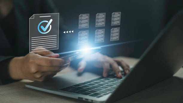 istock Document management performance checklist, businessman using checklist survey online. Manager is verifying the validity, security, approving, quality assurance by checkmark selection document. 1798534216