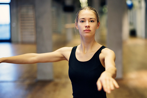 Teenage girl dancer practicing a la seconde pirouettes in a dance studio.
Show with Canon R5