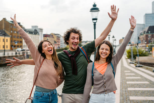 istock Three Young Friends On The Quayside In Malmo In Sweden 1798558117