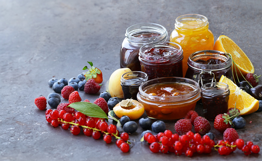 assortment of jams and preserves in jars