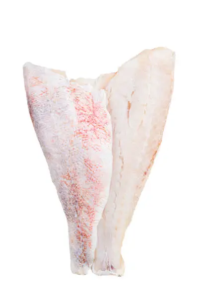 Raw red perch fillet, redfish fish meat.  Isolated, white background