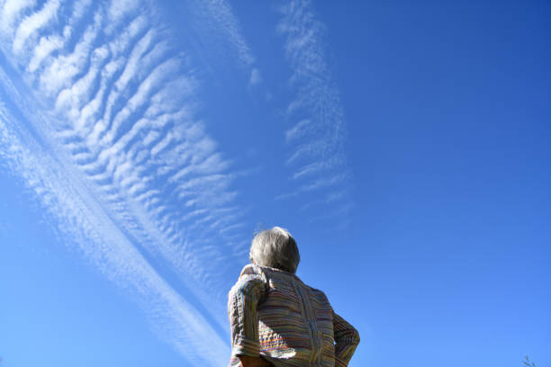 Senior woman looking at the blue sky