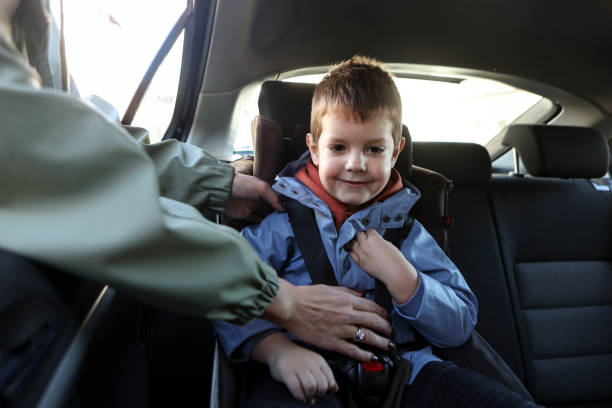istock Woman adjusting a car seat 1798575829