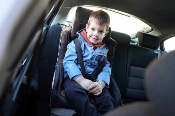 istock Boy sitting in a car seat 1798576397