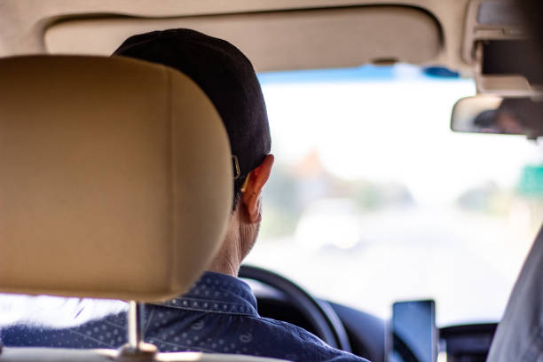 istock Driver driving car in the city 1798601117