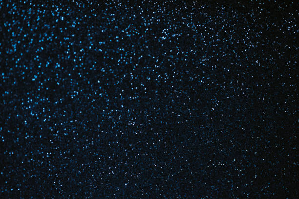 istock Dark blue blurred glitter bokeh. Blue Christmas texture. 1798606693