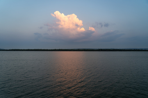 Beautiful view of Xingu river in the Amazon rainforest on sunny summer day at dusk. Para state, Brazil. Concept of nature, ecology, Climate change, global warming and environment.