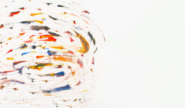 Splashing vibrant colors with blots on white background. Abstract colors concept. Artwork idea. Copy space.