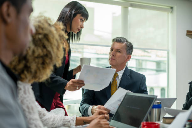 istock Manager and employee meeting in boardroom to exchange ideas 1798646712