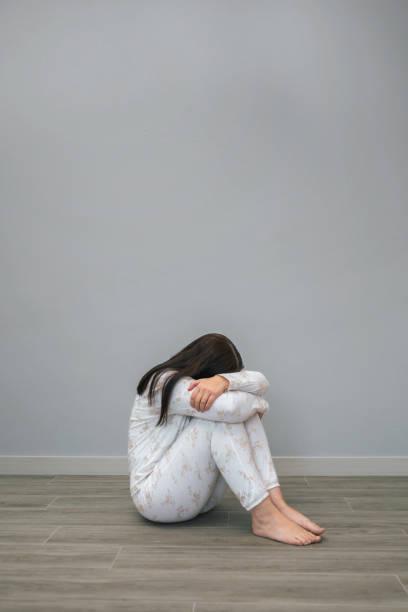 istock Woman with mental disorder and suicidal thoughts crying 1798651279
