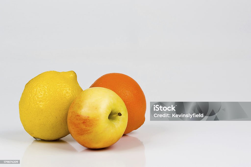 Fruit A selection of fruit apple, lemon and orange. Apple - Fruit Stock Photo