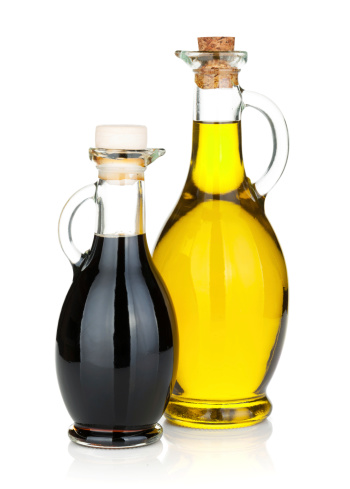 Olive oil and vinegar bottles. Isolated on white background