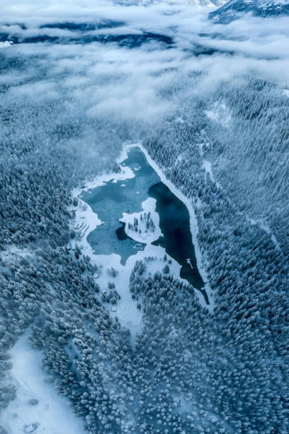 istock snow covered Lake Cauma in Switzerland in winter 1798771326