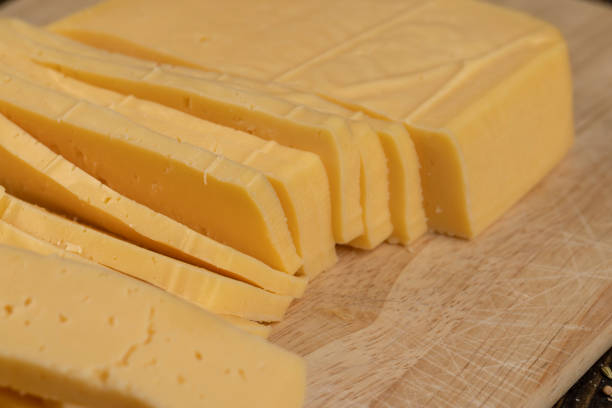 istock semi- hard cheese with holes cut into chunks 1798816993