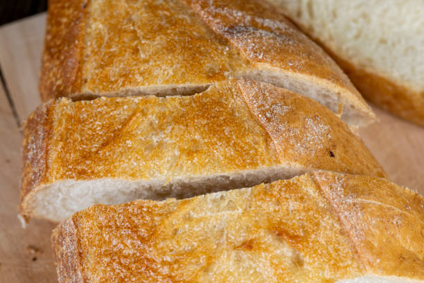 istock wheat loaf of bread close-up on the table 1798819379