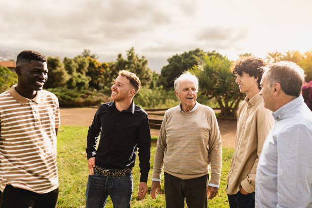 istock Happy multigenerational group of men with different ethnicities having fun in a public park - People diversity concept 1798831763