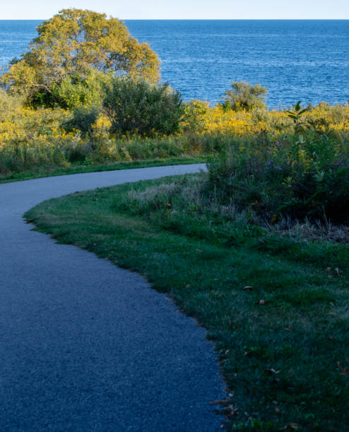 istock Tranquil waterfront trail in the evening 1798833394