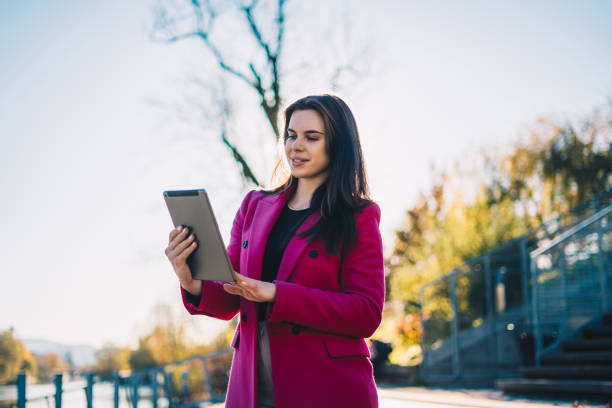 istock Young Female Using Tablet for banking stock photo 1798836573