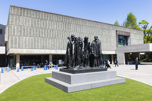 Tokyo, Japan - April 09, 2023: The Burghers of Calais sculpture in front of the National Museum of Western Art, made by Auguste Rodin, commemorating an event during the Hundred Years War