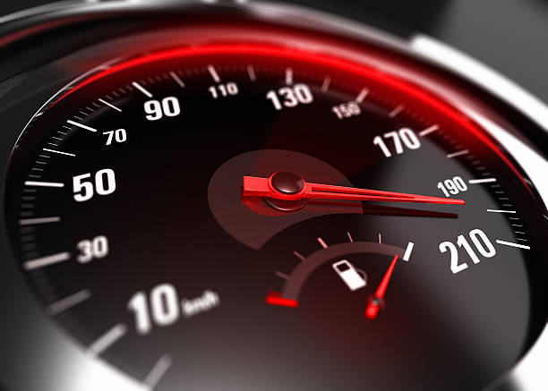 Excessive Speeding Careless Driving Concept Close up of a car speedometer with the needle pointing a high speed, blur effect, conceptual image for excessive speeding or careless driving concept kilometer photos stock pictures, royalty-free photos & images