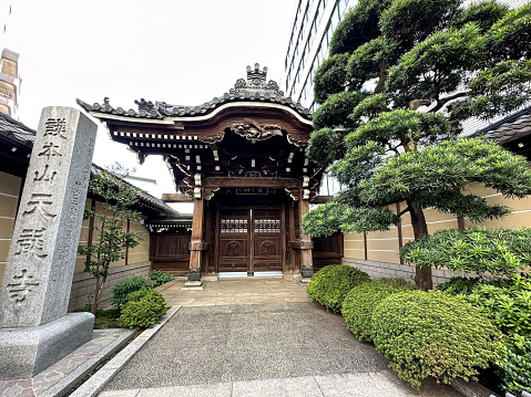 Tokyo, Japan - 03.11.2023. Tenryuji Temple entrance in Shinjuku, Tokyo, Japan. Buddhist Temple