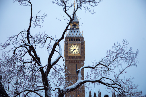 London transforms into a picturesque wonderland as delicate snowflakes blanket the city. The majestic Big Ben and Elizabeth Tower stands tall against the serene beauty of a snowy landscape, creating a magical scene that captures the essence of winter in the heart of the British capital.
Winter in London, Snowfall, Big Ben, Snowy Landscape, Cityscape, Winter Wonderland, London Landmarks, Iconic Architecture, Seasonal Beauty, Urban Winter