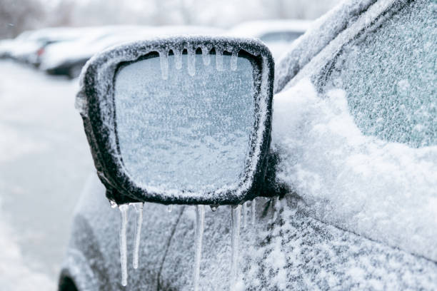 istock car covered with ice after snowstorm 1798956771