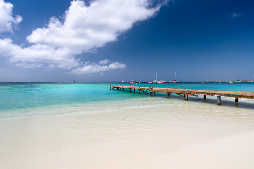 Dock on beautiful shoreline, Palm Beach, Aruba