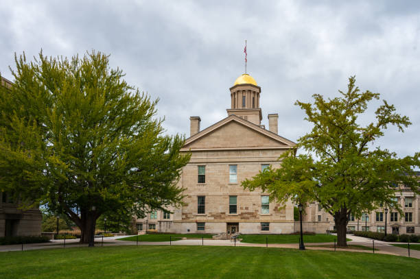 Old Iowa State Capitol in Iowa City Gold-domed Old Iowa State Capitol in Iowa City iowa flag stock pictures, royalty-free photos & images