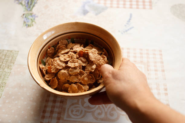 Whole grain flakes in the clay plate