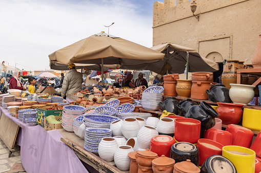 Kairouan, Tunisia. March 14, 2023. Tableware and pottery for sale at the Kairouan souk.
