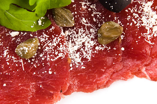 Beef carpaccio with rucola and parmesan