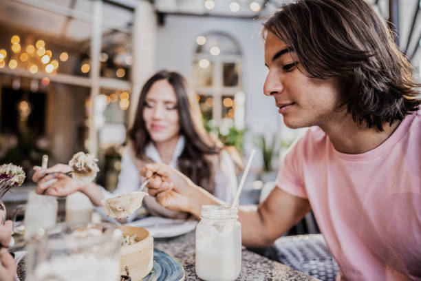 istock Young man eating chinese food on a restaurant 1799033795